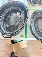 Lid with dimples and speckled enamel finish