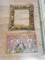 Openwork carved frame and separate framed tapestry shown together