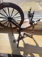 Full view of wooden great wheel spinning wheel with flyer assembly