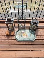 Group shot of tray, two lanterns, bottle holder, bird figurines