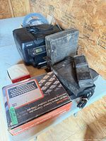 Overview showing Epson printer, boxed computer, finned modules, pedals, cables