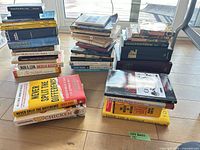 All four stacks showing breadth of titles and formats