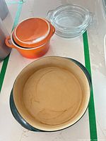 Large Pampered Chef casserole interior showing staining