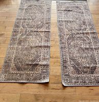 Two narrow oriental-style runners side by side