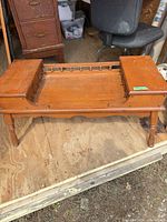 Full view of wood telephone bench showing overall design and finish