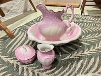 Pitcher, basin, creamer and covered dish grouped together