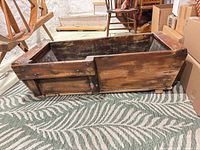 full view of wooden dough box front and interior