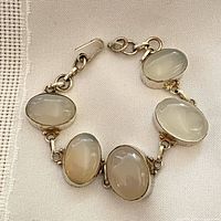 Bracelet coiled showing cabochons and clasp