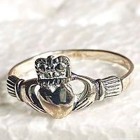 Front view of sterling silver Claddagh ring showing heart, crown and hands detail