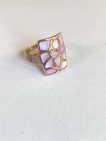 Ring front view showing mother of pearl inlay