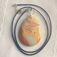 Front view of pendant on coiled cord