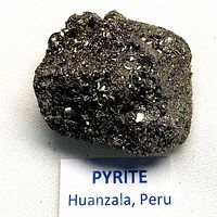 Front view of metallic pyrite cluster from Huanzala, Peru