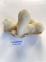 Front view of chalcedony specimen with label