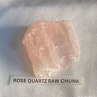 Front view of the raw rose quartz chunk