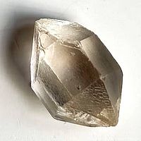 Overall view of quartz crystal showing prismatic faces