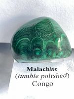 Oblique view showing polished surface and banding