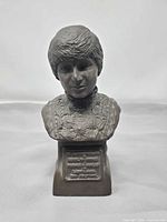 Front view of bronze-tone Lady Diana bust with commemorative plaque