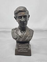 Front view of bronze-finish Prince Charles bust on plinth