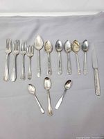 Full layout of all 14 cutlery pieces