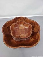 Top view large bowl stacked with six small bowls