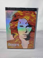 Front view of DVD case showing holographic cover art