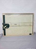 Full view of drawing board with ruler locked at centre