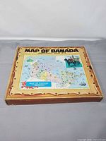 Top view of puzzle box showing full map illustration and title