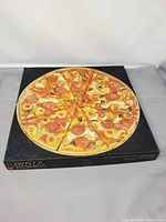 Box lid showing completed pizza image