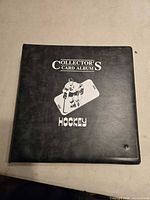 Front cover of black Collector’s Card Album binder