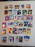 All 59 rookie baseball cards laid out on table