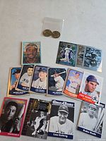 Group shot of all cards and coins laid out on table