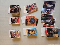 Eight stacks of basketball trading cards on table