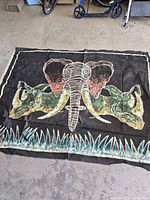 Full view of batik fabric print laid flat