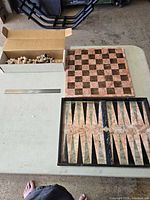 overall lot with chess pieces box, chessboard, backgammon board