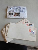 Sealed NFL envelope, eight stamp covers, Breathe Right sample envelope