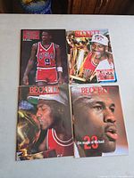 All four Beckett Basketball Monthly magazines laid out