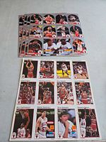 Five uncut Chicago Bulls card sheets laid out