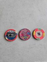 Three casino chips laid out—Hyatt, Tropicana Valentine’s Day, Bally’s