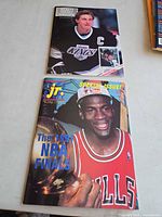 Both magazines front covers