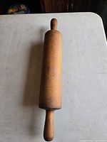 Top-down view of entire wooden rolling pin
