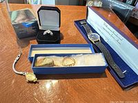 Group shot showing all five items with their boxes