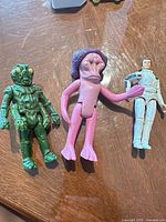 Group shot of three action figures