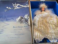 Full view of boxed Snow Princess Barbie with snow scene lid