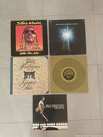 Group shot of all four albums and Springsteen insert