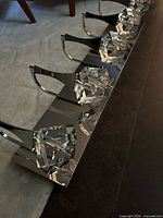Top view of full five-light chrome fixture showing glass shades