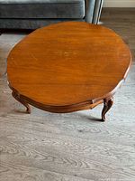 Full view of round French Provincial coffee table