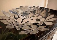 Top view of stainless steel floral bowl on table