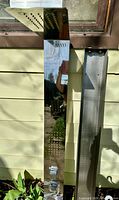 Full stainless shower panel and separate back bracket outdoors