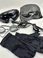 Group shot: Speedo cap, Wolfbike goggles, swim goggles, Tommy Copper gloves
