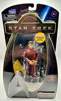 Front view of sealed Cadet Chekov figure in package showing figure and accessories
